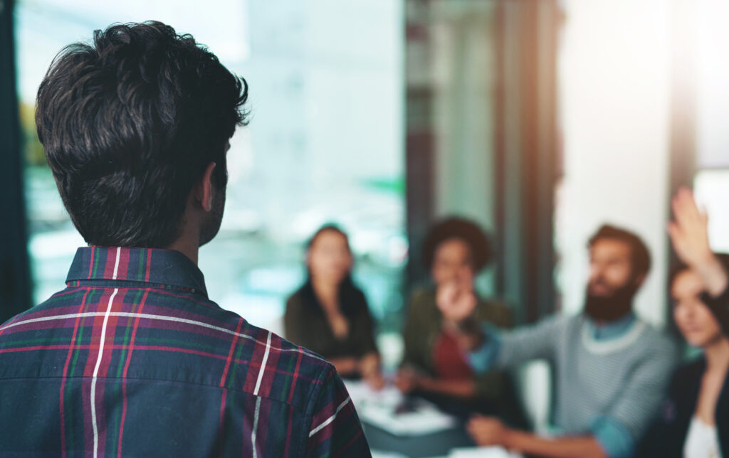 man giving presentation confidently